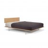 v-leg-bed-with-cane-headboard-01